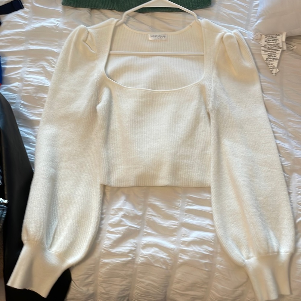 White cropped sweater.